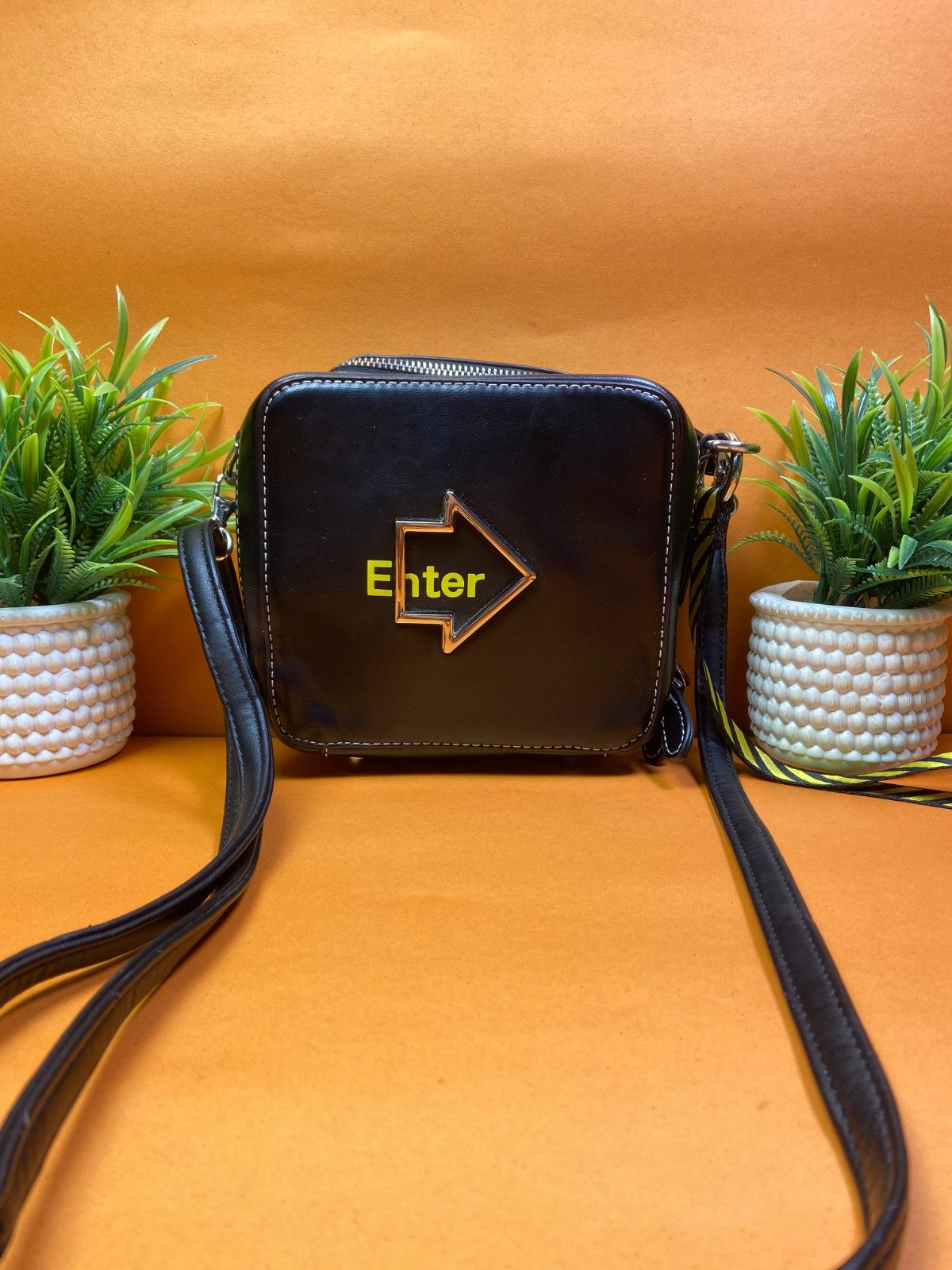 Enter Arrow Crossbody